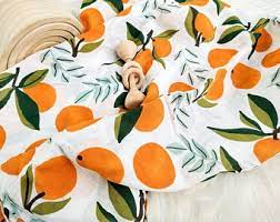 Oranges- Snug As Baby Swaddle